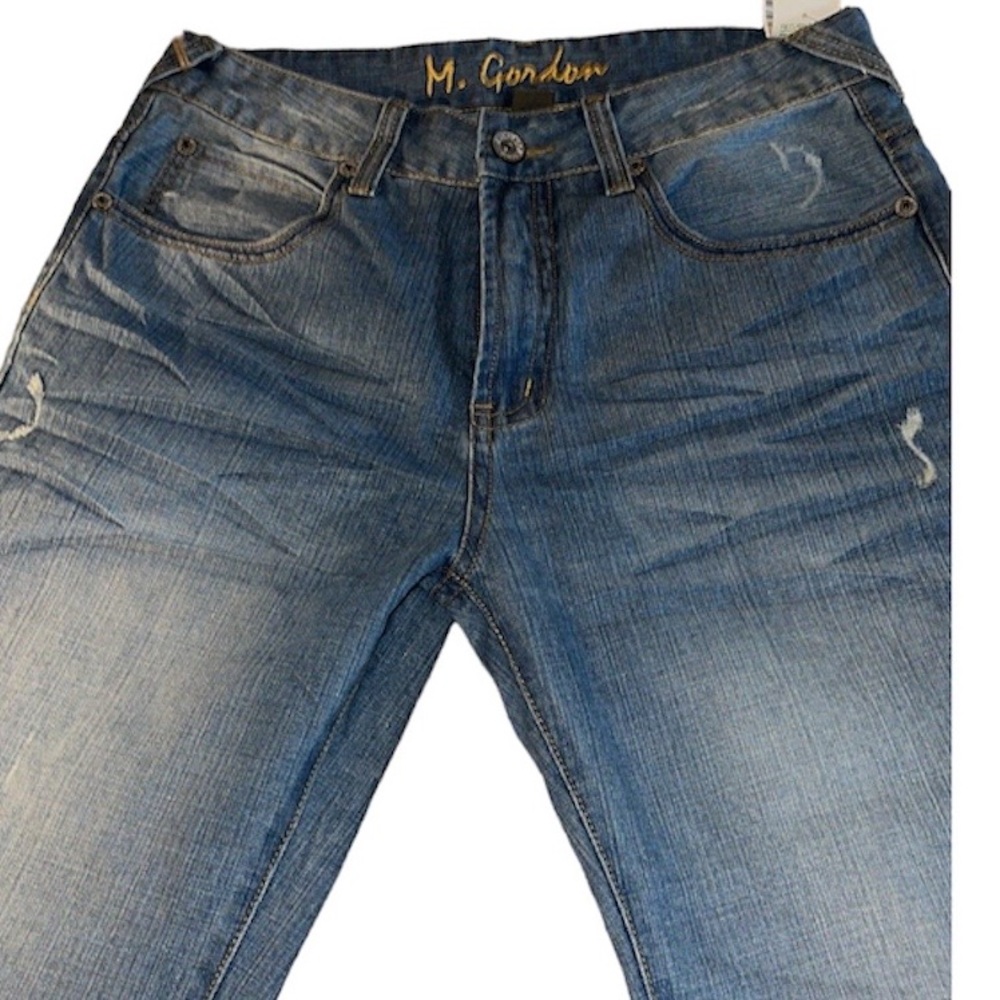 M. Gordon distressed men’s jeans with Skull design on back pocket 34 X 34